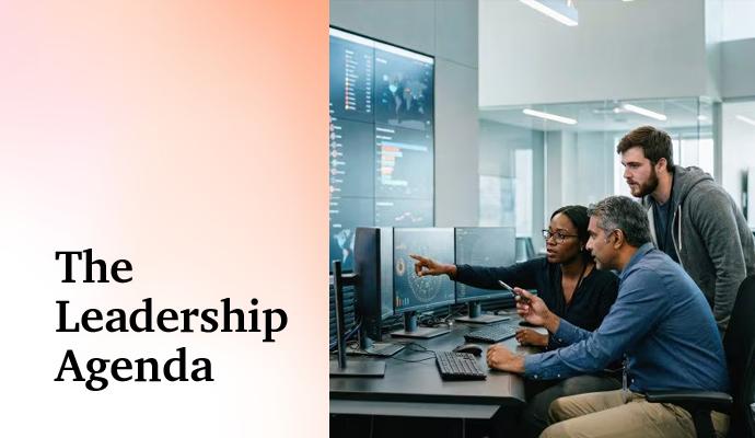 Team reviewing charts and information on computer screens in a modern office. Team reviewing charts and information on computer screens in a modern office.